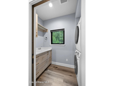Nestled on the picturesque Priest Lake Golf Club, this brand new - photo 24