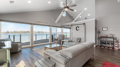 Experience the ultimate waterfront oasis in this masterfully - photo 25