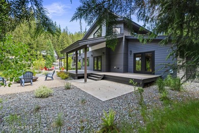 Nestled on the picturesque Priest Lake Golf Club, this brand new - photo 32