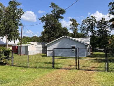 Two deeded waterfront lots on Lake Murvaul. Two homes. The - photo 2