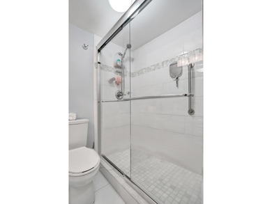 Updated 2 bedroom, 2 bathroom condo. Features an open floor plan - photo 32