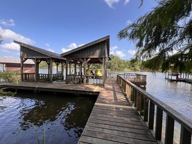Two deeded waterfront lots on Lake Murvaul. Two homes. The - photo 3