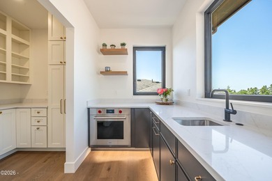 Just completed new construction, this modern residence blends - photo 10