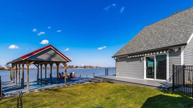 Experience the ultimate waterfront oasis in this masterfully - photo 55