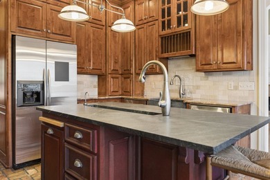 PRICED $15K BELOW AUGUST APPRAISAL! Nestled on approximately 16 - photo 4