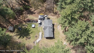For those seeking a secluded cabin in the woods, this charming - photo 4