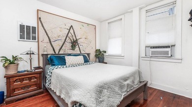This nice Main street triplex could be your next investment - photo 2