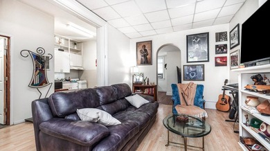 This nice Main street triplex could be your next investment - photo 3