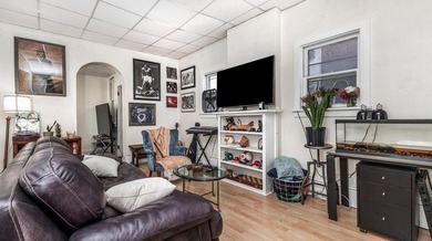 This nice Main street triplex could be your next investment - photo 4