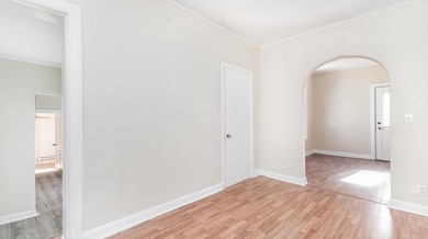 This nice Main street triplex could be your next investment - photo 6