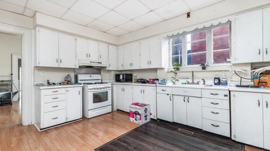 This nice Main street triplex could be your next investment - photo 8