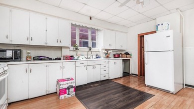 This nice Main street triplex could be your next investment - photo 9