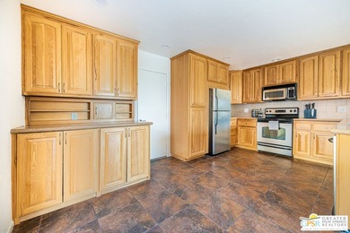 Resort Style Living at Cathedral Canyon Country Club! This light - photo 12