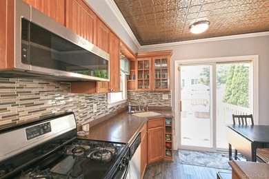 Welcome to this beautifully updated Cape Cod situated on a - photo 14