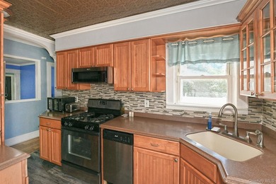 Welcome to this beautifully updated Cape Cod situated on a - photo 17