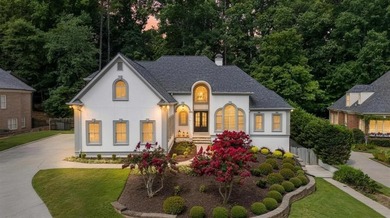 This extensively renovated Wellington Lake home stands out for - photo 1