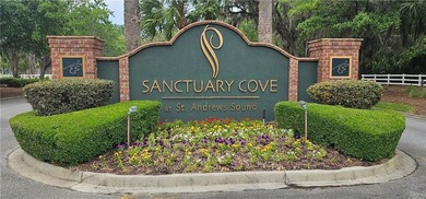 This is a beautiful buildable lot in Sanctuary Cove that is - photo 1