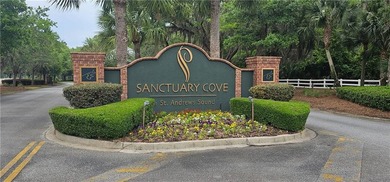 This is a beautiful buildable lot in Sanctuary Cove that is - photo 8