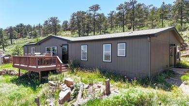 Escape to the tranquility of Carter Lake living. This property - photo 2