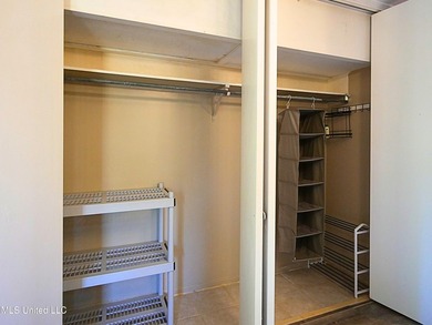 This move-in-ready condominium is ideally located in a desirable - photo 11