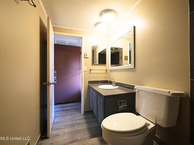 This move-in-ready condominium is ideally located in a desirable - photo 12