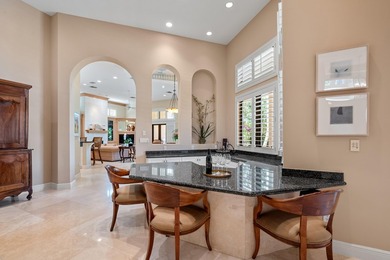 Nestled on a serene cul-de-sac within the prestigious gated - photo 13