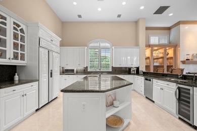 Nestled on a serene cul-de-sac within the prestigious gated - photo 16