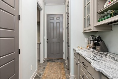 Gorgeous home with electric gate entrance on an open body of - photo 16