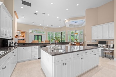 Nestled on a serene cul-de-sac within the prestigious gated - photo 17