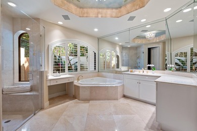 Nestled on a serene cul-de-sac within the prestigious gated - photo 27