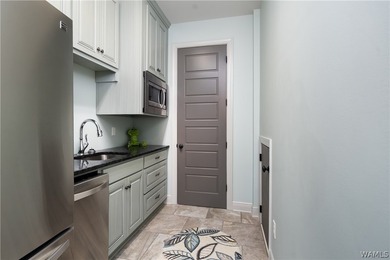 Gorgeous home with electric gate entrance on an open body of - photo 27