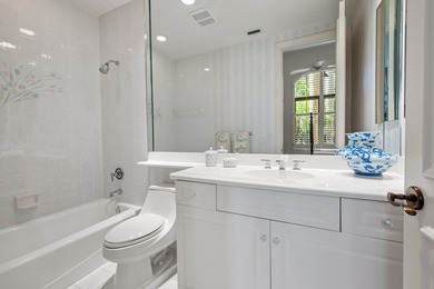 Nestled on a serene cul-de-sac within the prestigious gated - photo 32