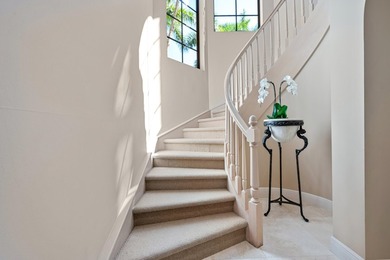 Nestled on a serene cul-de-sac within the prestigious gated - photo 34