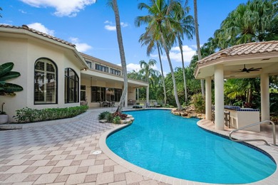 Nestled on a serene cul-de-sac within the prestigious gated - photo 48