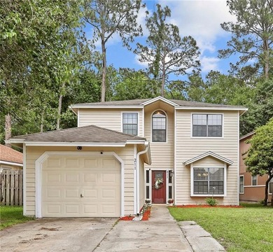 Beautifully updated and competitively priced in the highly - photo 1