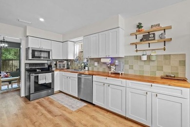 Beautifully updated and competitively priced in the highly - photo 7