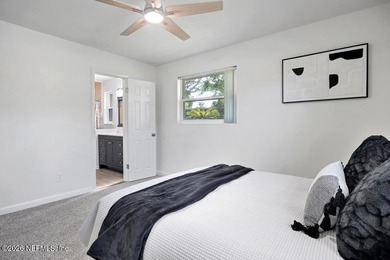 Welcome home to this inviting 3-bedroom, 2-bath pool home - photo 11