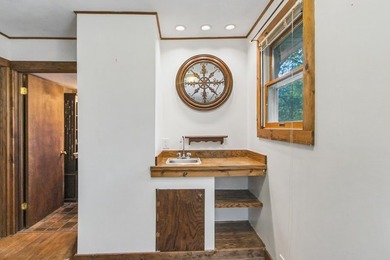Nestled on a private .29-acre lot surrounded by mature trees - photo 12