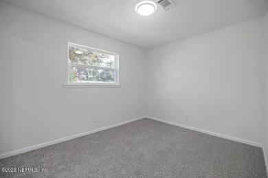 Welcome home to this inviting 3-bedroom, 2-bath pool home - photo 15