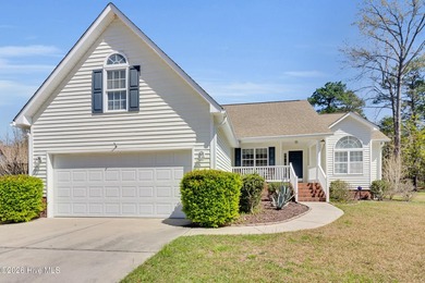 Light-filled, airy, and designed for easy coastal living, this - photo 1