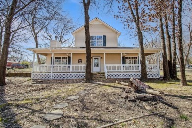 Kicking it southern style, porch side! Wide open spaces with - Lake Home For Sale in Emory, Texas