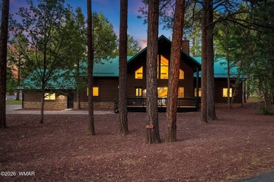 Experience mountain luxury and serene golf course living in this - photo 1