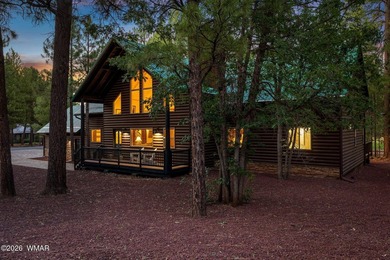 Experience mountain luxury and serene golf course living in this - photo 3