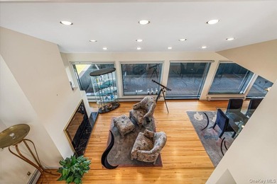 Set behind private gates on an oversized waterfront parcel, this - photo 12