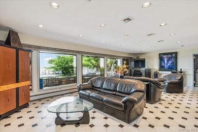 Set behind private gates on an oversized waterfront parcel, this - photo 14