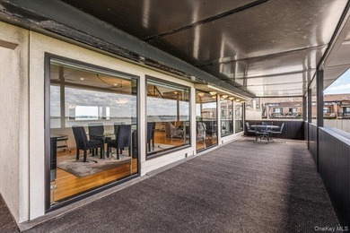 Set behind private gates on an oversized waterfront parcel, this - photo 22