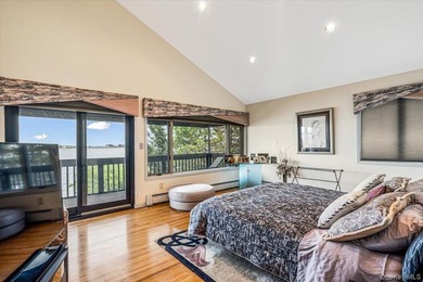 Set behind private gates on an oversized waterfront parcel, this - photo 28