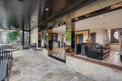 Set behind private gates on an oversized waterfront parcel, this - photo 30