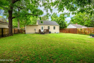 Tucked beneath beautiful mature trees in the heart of town, this - photo 31