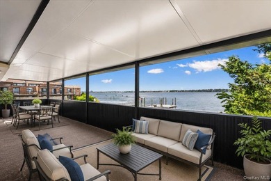 Set behind private gates on an oversized waterfront parcel, this - photo 32